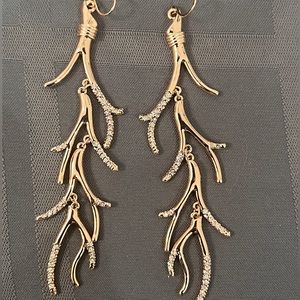 Coral like earrings with crystal stones.